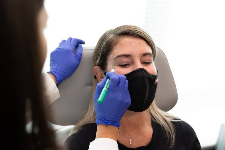 A woman receives Botox near Georgetown