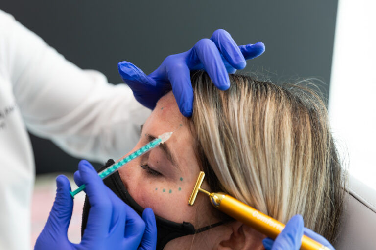 A woman receives Botox in Cedar Park