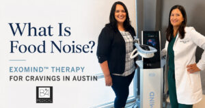 Patient with Dr. Nicole Basa MD next to EXOMIND therapy machine at B+A Medical Center Austin TX